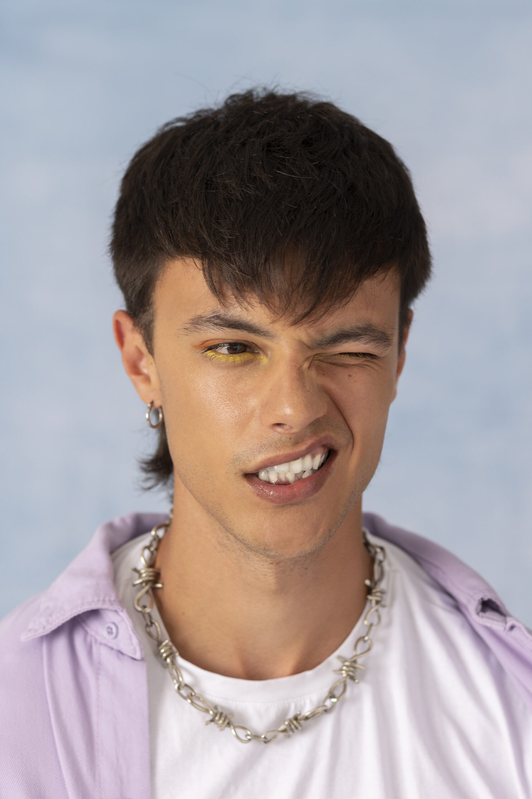 young-man-wearing-chain-necklace